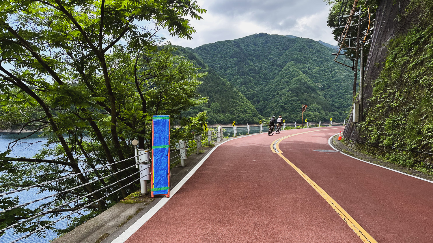 Cycling along Lake Okutama, Japan